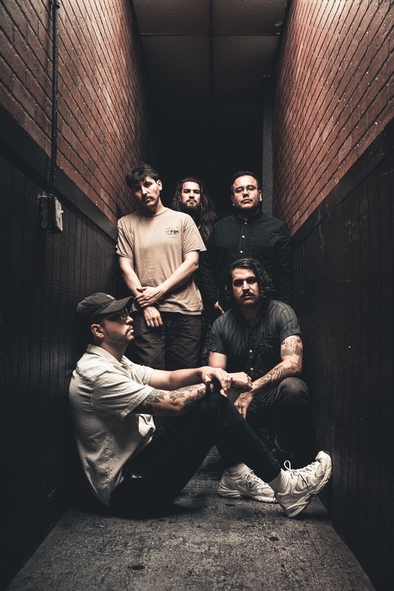 Bloodlines in a narrow brick corridor